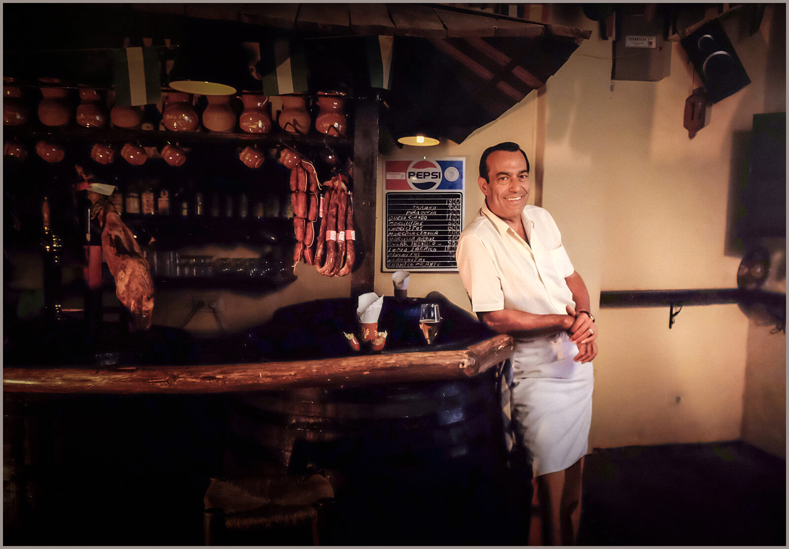 Professional Portraiture Photography of a barman in a bar in Spain
